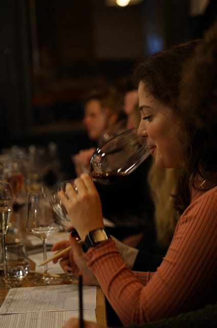 8-Tier Hungarian Wine Tasting in a Cozy Downtown Wine Bar - Finding Bortodoor fast: that white circular sign