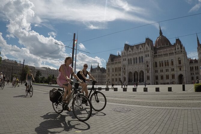 Budapest Bike Tour with Hungarian Goulash - Széchenyi Baths pool views and the House of Music Hungary detour