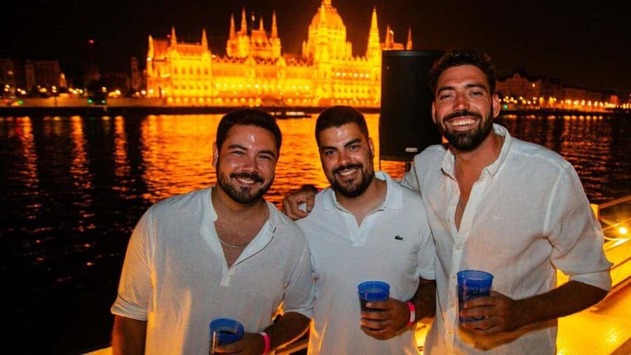 Budapest: Danube Beat Party Cruise with DJ & Drink Packages - Onboard Life: DJ, Photographer, Cloakroom, and the Real Party Pace