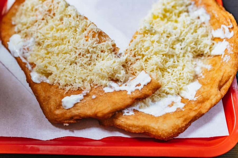 Budapest Food Walking Tour: Eat, Sip & Explore Like a Local - Moving from street snacks to sit-down Hungarian classics