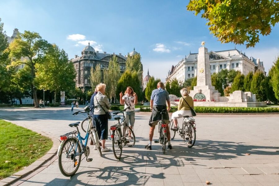 Budapest: Guided City Discovery Bike Tour - Cycling comfort: flat riding, helmet use, and who should skip it