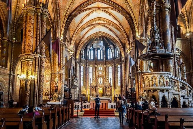 Budapest: Matthias Church Entry Ticket - Entering the church: stained glass, frescoes, and the quiet impact