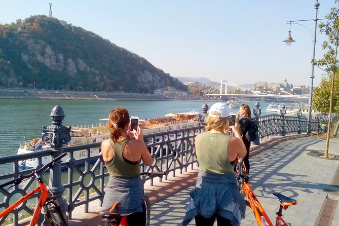 Budapest relaxed bicycle tour at sunset - Shoes on the Danube Bank: stop for meaning, not just photos