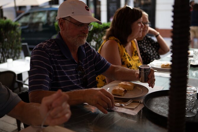 Budapest Urban Feast - Food Tour with Wine Tasting & Coffee House - Meeting point, walking comfort, and all-weather planning