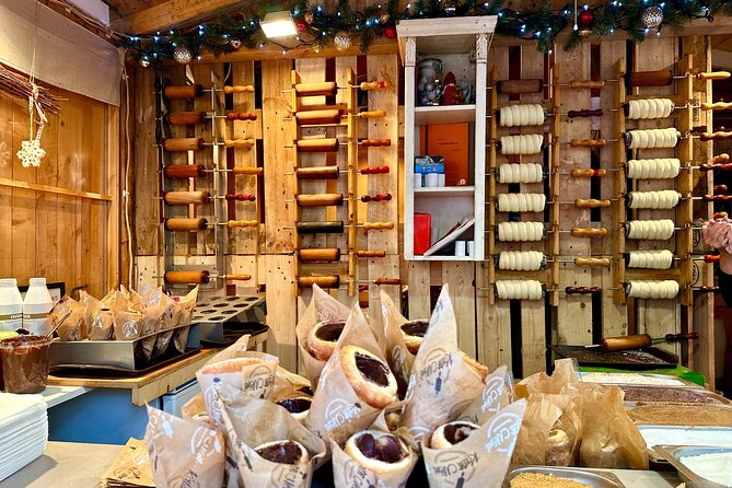 Budapest Wonderland - A Christmas Market Tour with Chimney Cake & Mulled Wine - Gresham Palace Christmas Market and the Chimney Cake Moment