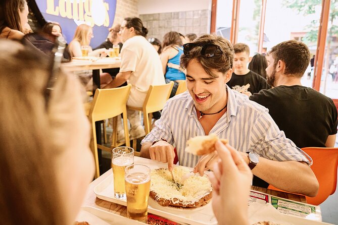 Central Budapest Food Walking Tour with Drinks Included - Andrássy Avenue finish: upscale streets, comfort classics, and dessert with tokaj