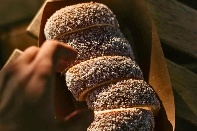 Kürtőskalács: Chimney Cake Workshop in City Park Budapest - The hands-on moment: rolling in toppings after baking