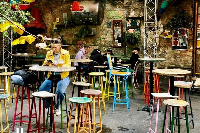 Ruin Pub Walking Tour with a Local Hostess in Budapest - Corvinus Café Dóhány: First Included Beer and Communist-Era Stories