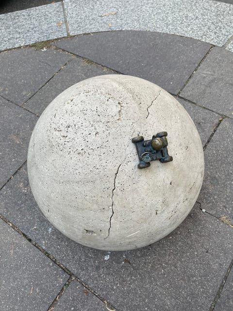 Tiny Sculptures, Big Stories: Kolodko mini statue tour - What to Expect on the Ground: Walking, Searching, and Staying Warm