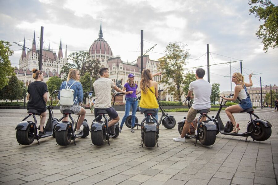 Top sights of Pest downtown on e-scooters incl. Parliament - St. Stephen’s Basilica Photo Stop: First Landmark, Fast Confidence