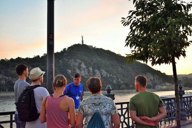 Welcome to Budapest Evening Walk - Liberty Bridge: Turul birds, the Gellért Thermal Bath area, and the bottle opener statue